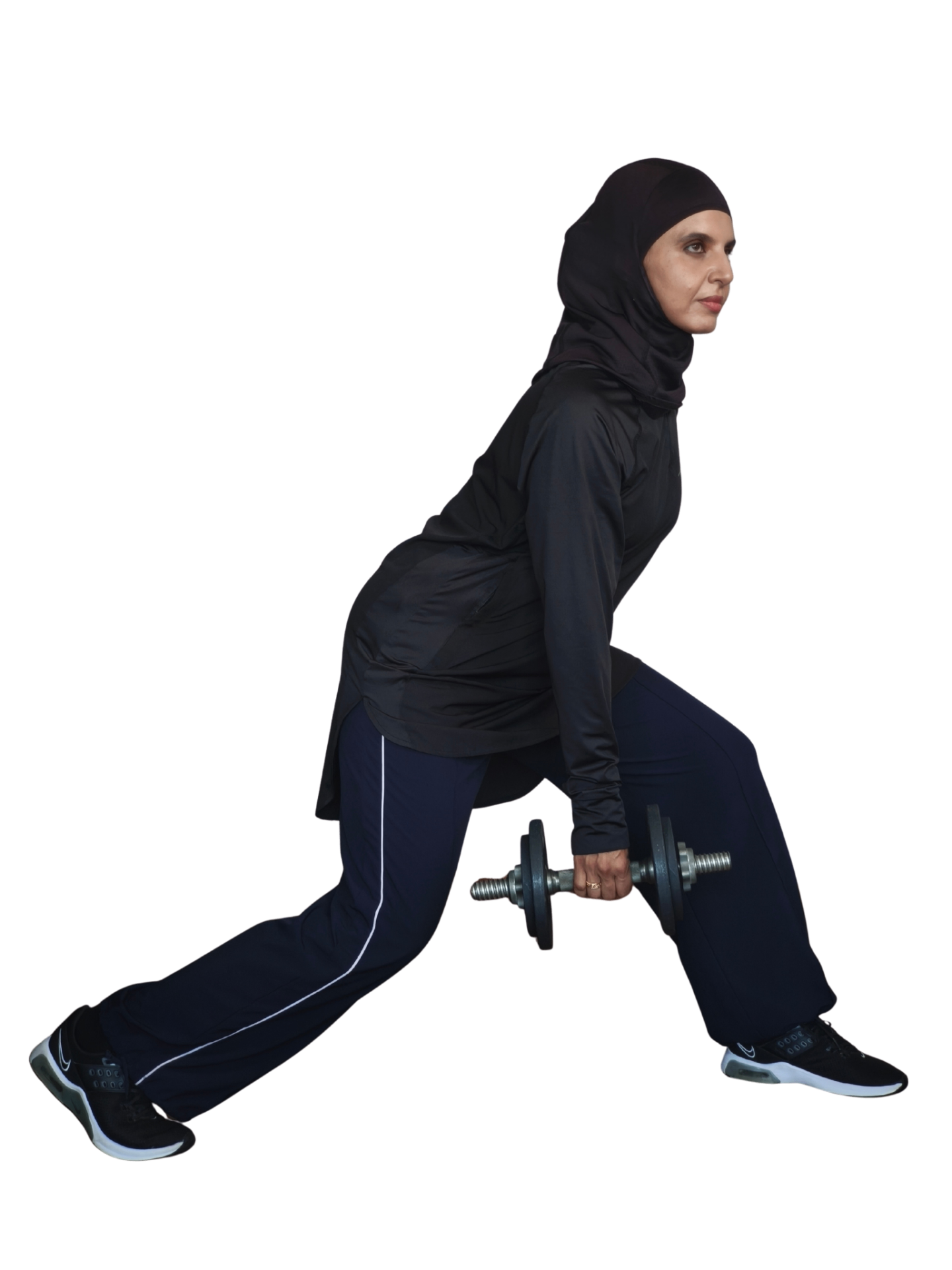 Coach Hebah performing a dumbbell split squat