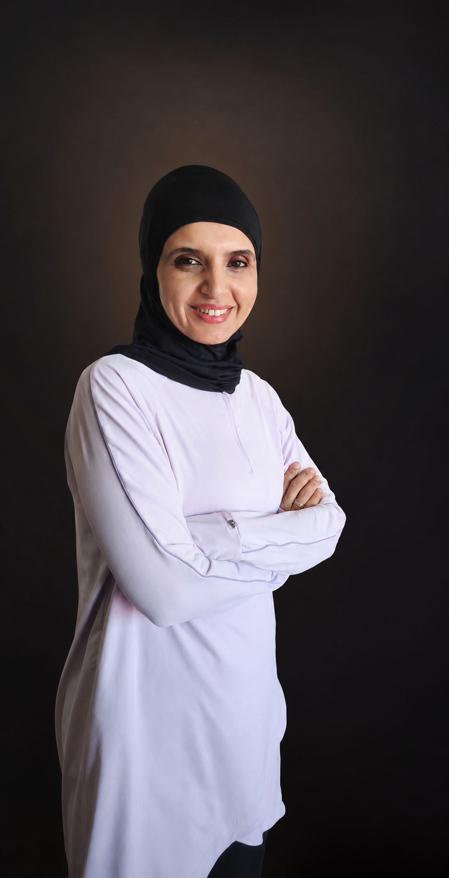 Coach Hebah today, standing strong with crossed arms